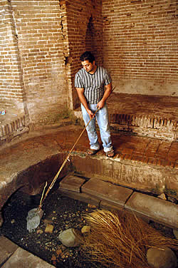 Fishing for mahi-sia in the qanat in the village of Bashteem